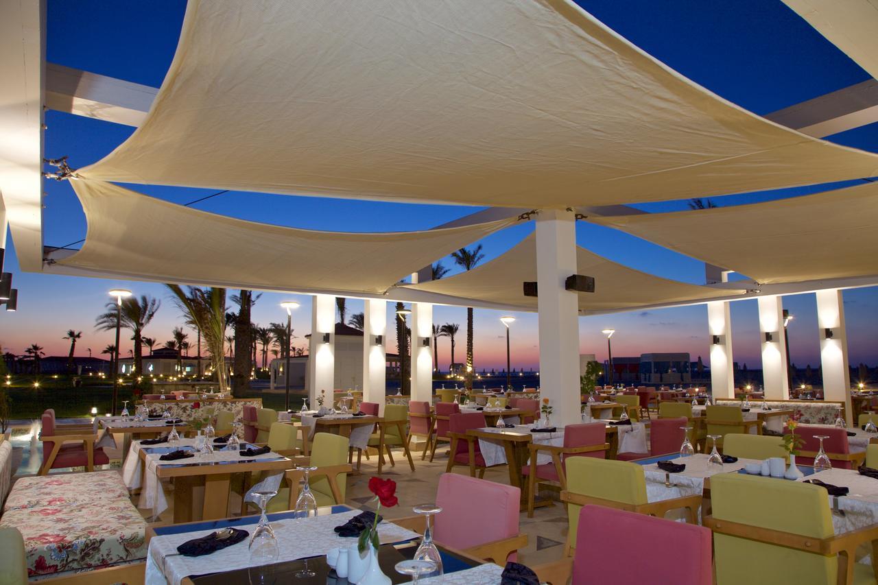Rixos Alamein - Full Board Plus El Alamein Buitenkant foto Restaurant at the hotel